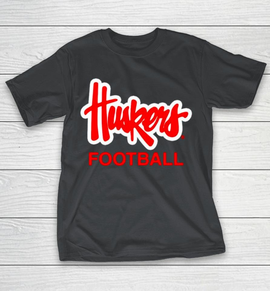 Adam Dimichele wearing Huskers football Shirts